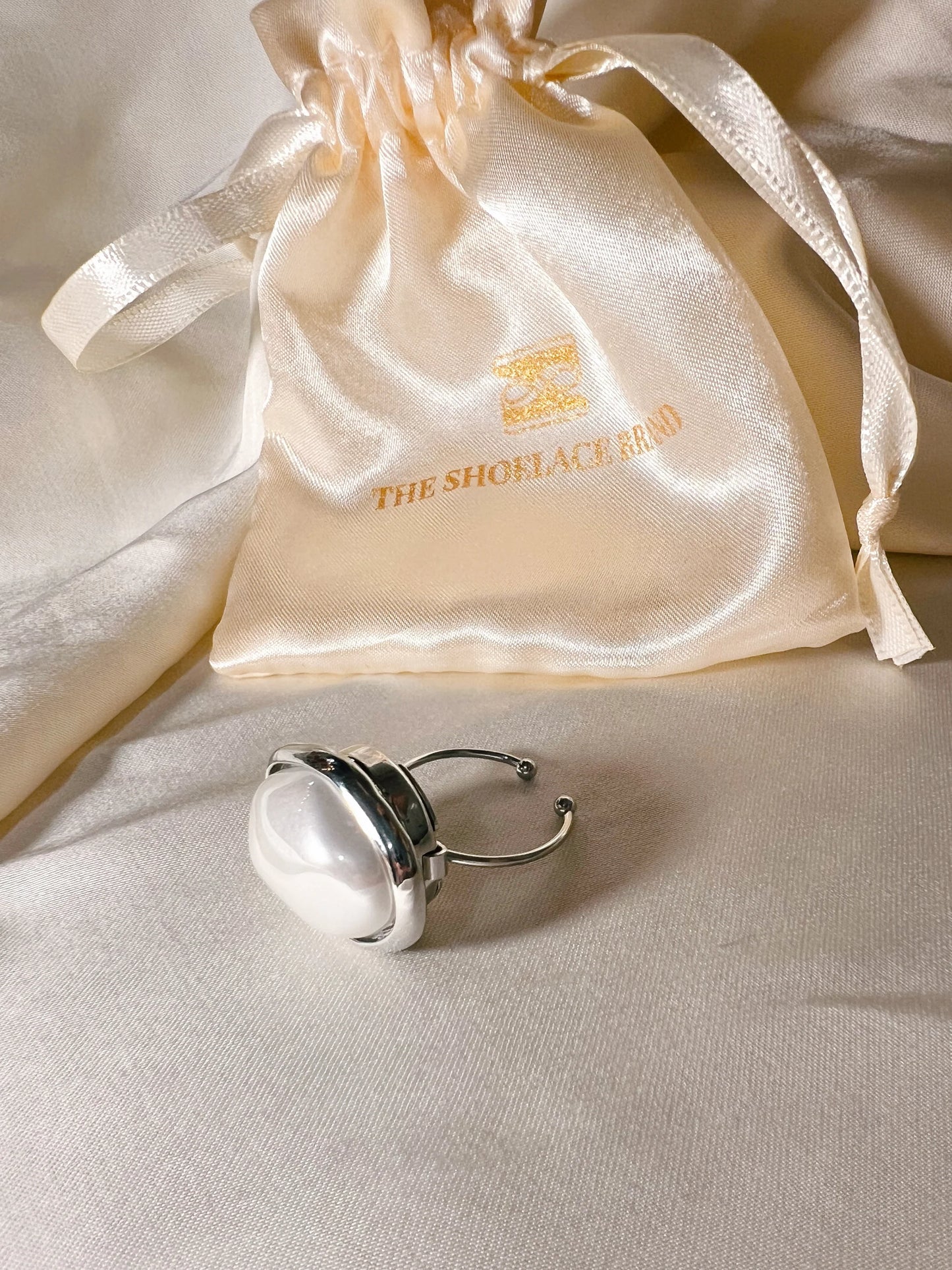 SILVER JUSTERBAR RING – KNAPPFOT 50.04