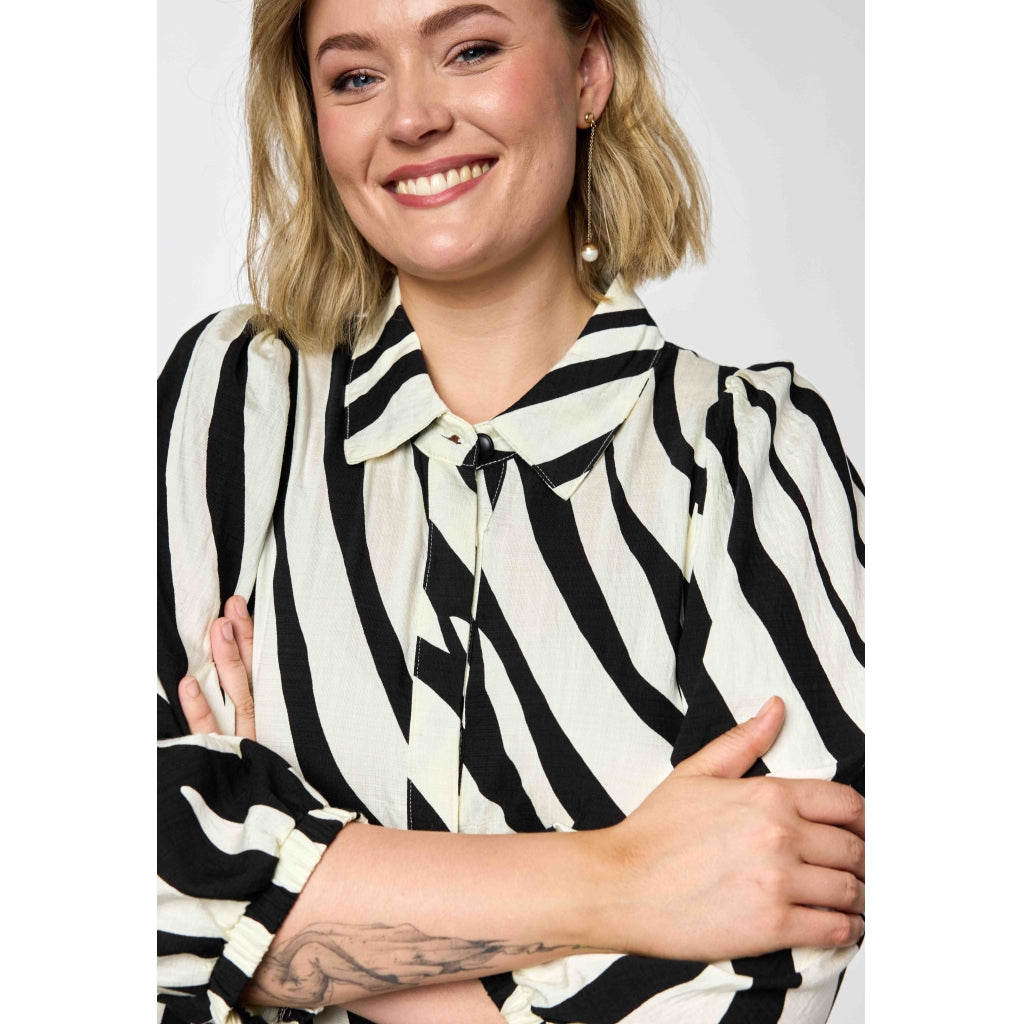 Zebra mönstrad klänning från Gozzip G262047