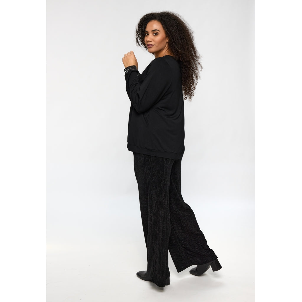 Byxor med vida ben från Studio S256838