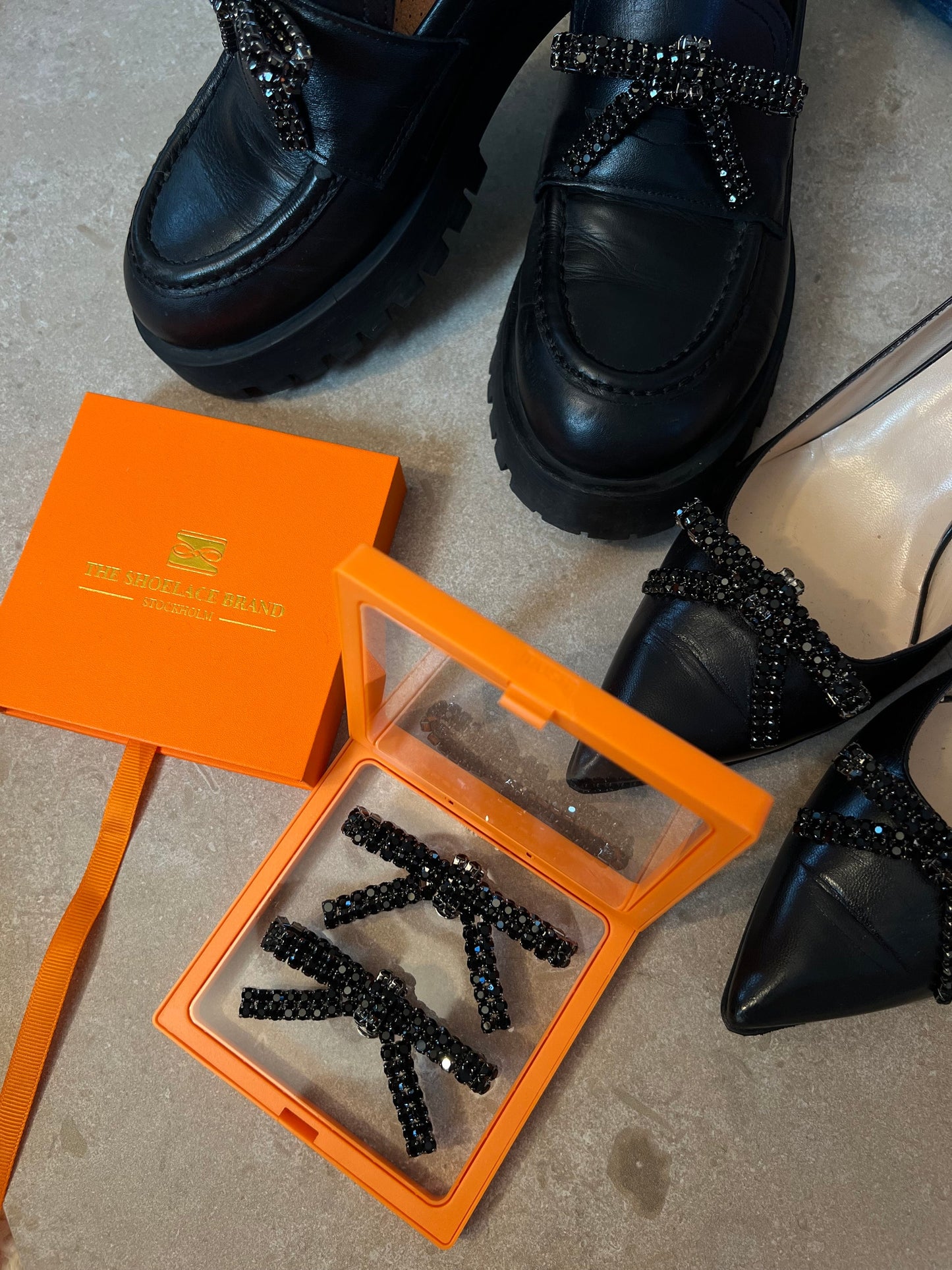 Skosmycke svart rosett 60.04