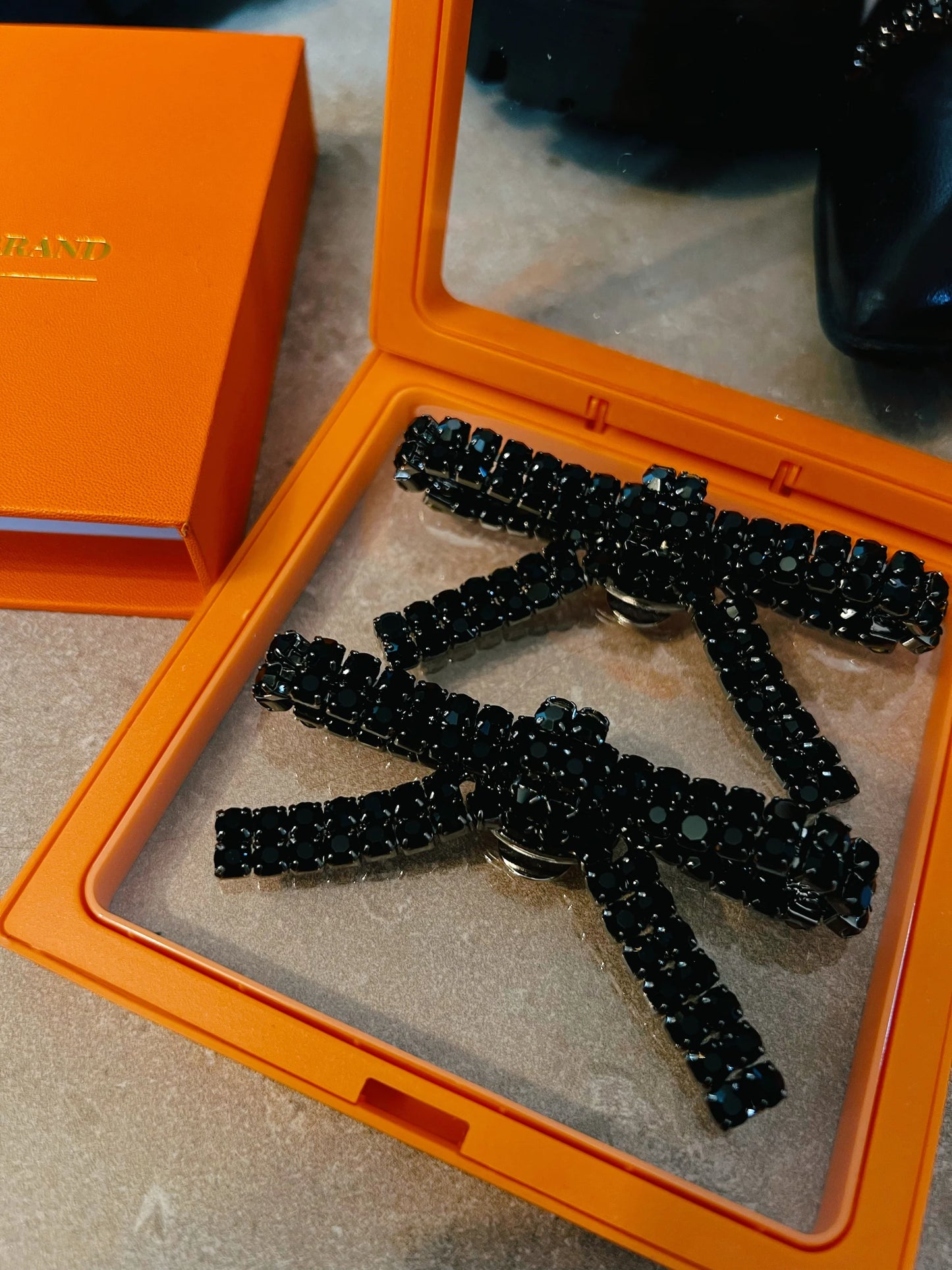 Skosmycke svart rosett 60.04